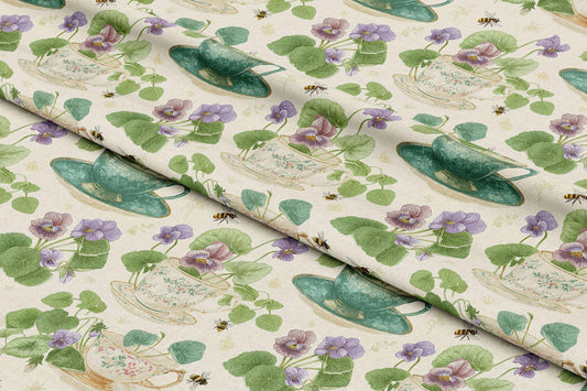 a close up of a table cloth with flowers on it